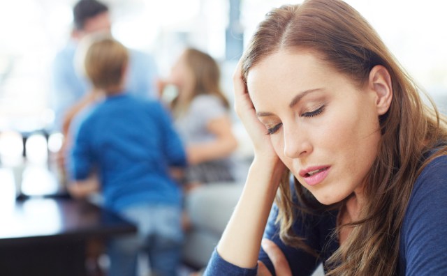 Photo of a woman looking exhausted